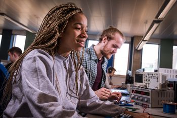 Two computer science students working